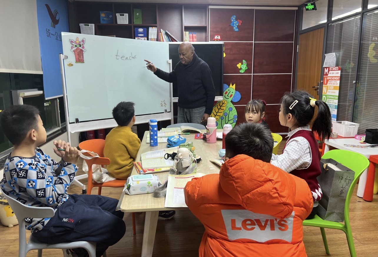 Teacher Joe with students